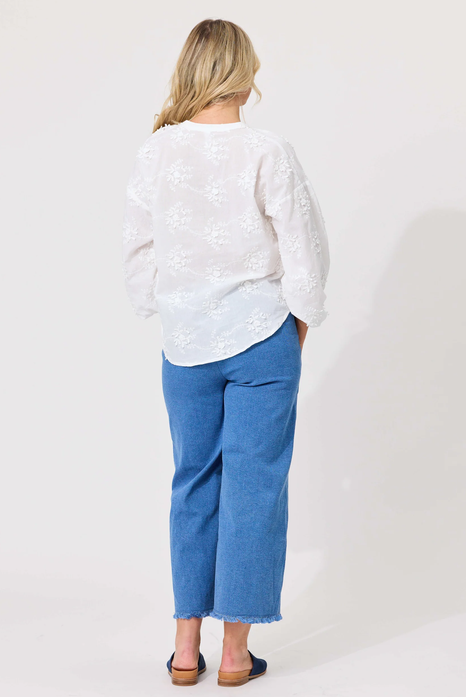 Lemon Tree Alba Top in White back view featuring floral embroidery and relaxed fit.