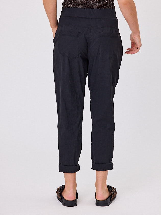 Navy & Co Voyage Pant in Black with back patch pockets, back view