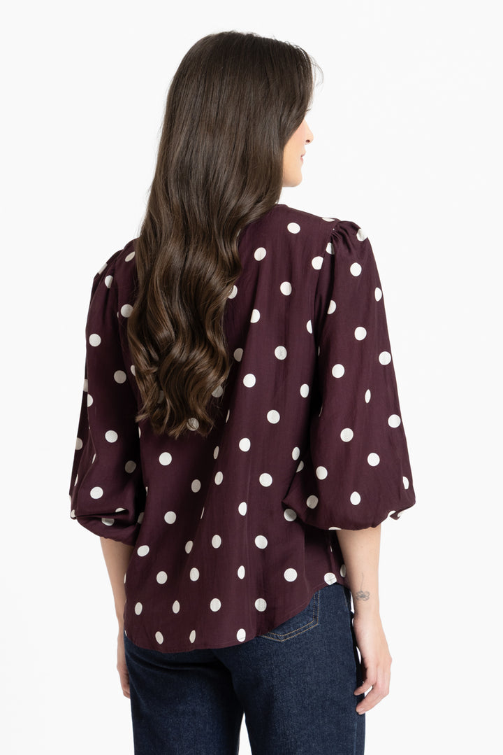 Seeking Lola Brilliance Blouse in Affogato Spot polka dot print back view