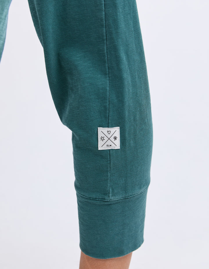 Elm Brunch Pant Teal ribbed cuff close-up view.