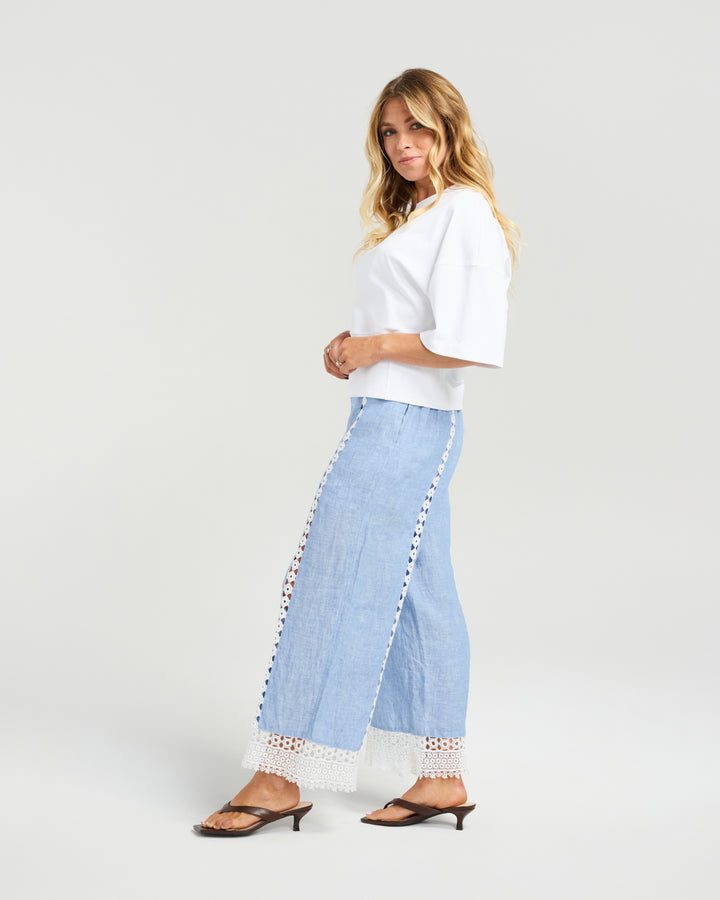 Side view of the Flynn Pant in Powder Blue by NMBR Rose.