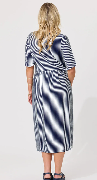 Lemon Tree Madonna Dress in Navy Stripe front close-up view with short sleeves and pockets.