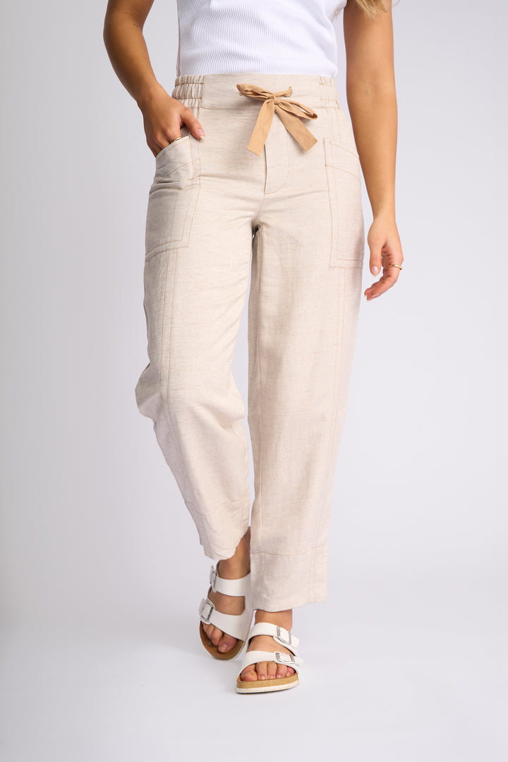 Knewe Dew Pant in Natural front view close-up.