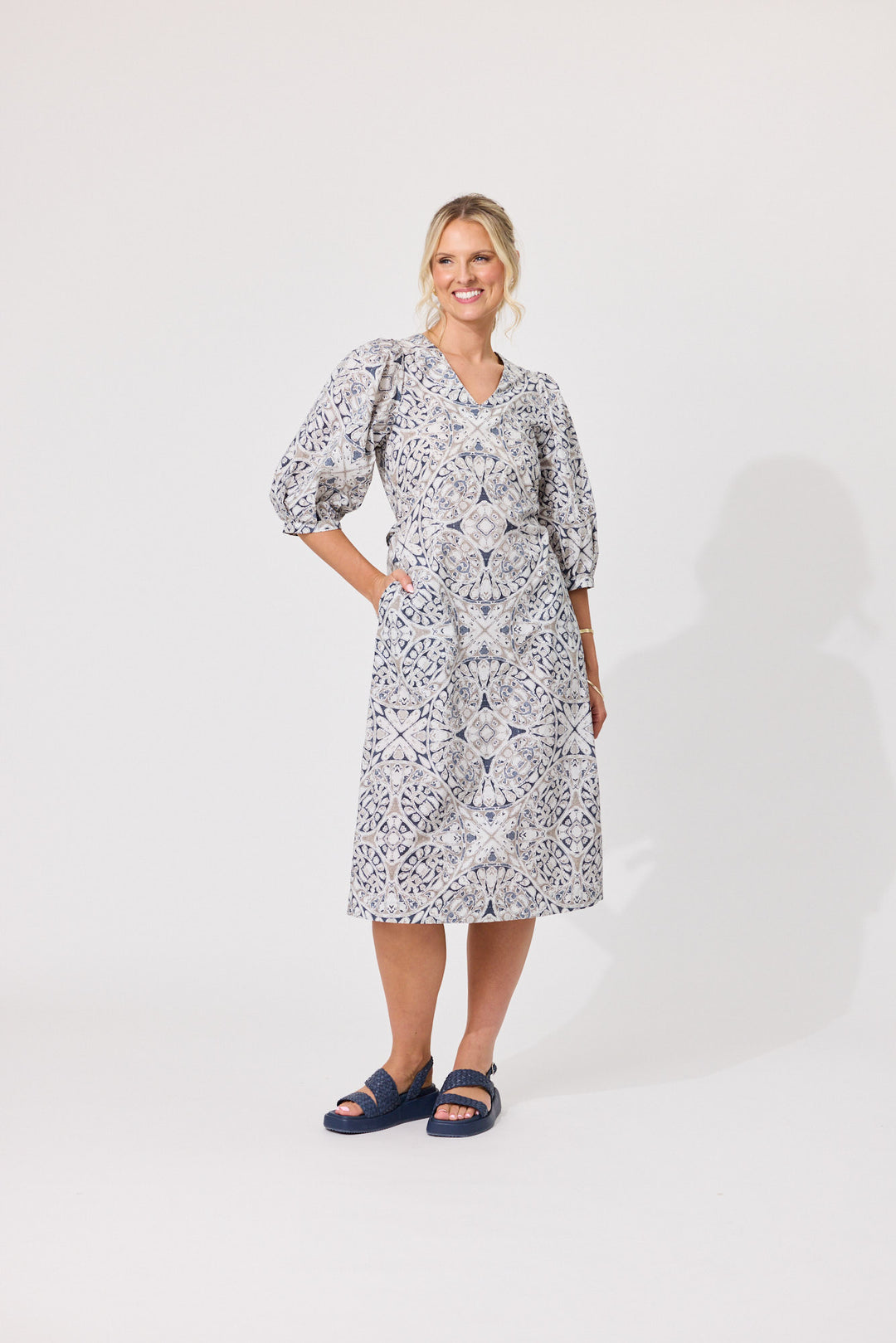 Front view of Lemon Tree Nika Dress in Mosaic Print featuring 100% cotton fabric and puff sleeves.