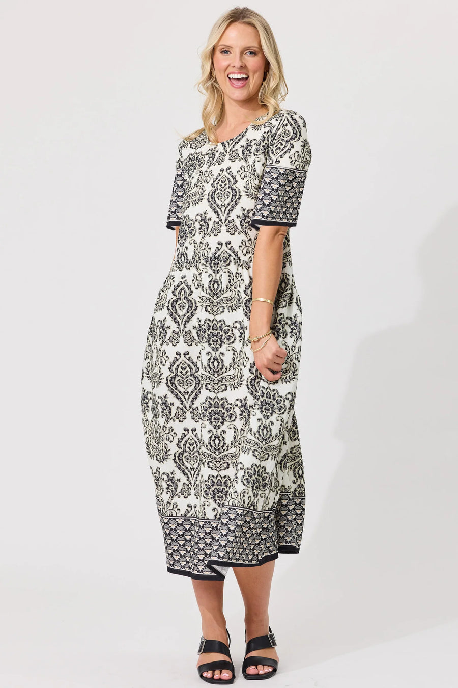 Lemon Tree Madonna Dress in Black Persian print maxi length front view.