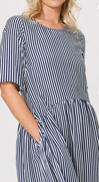 Lemon Tree Madonna Dress in Navy Stripe front close-up view with short sleeves and pockets.