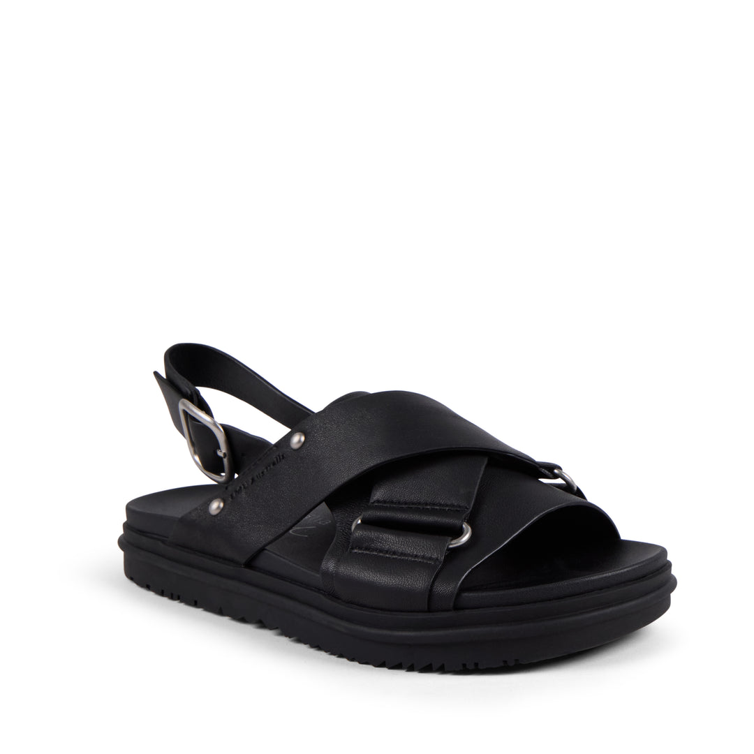 EMU Australia Faye Black leather crossover buckle sandal side view.