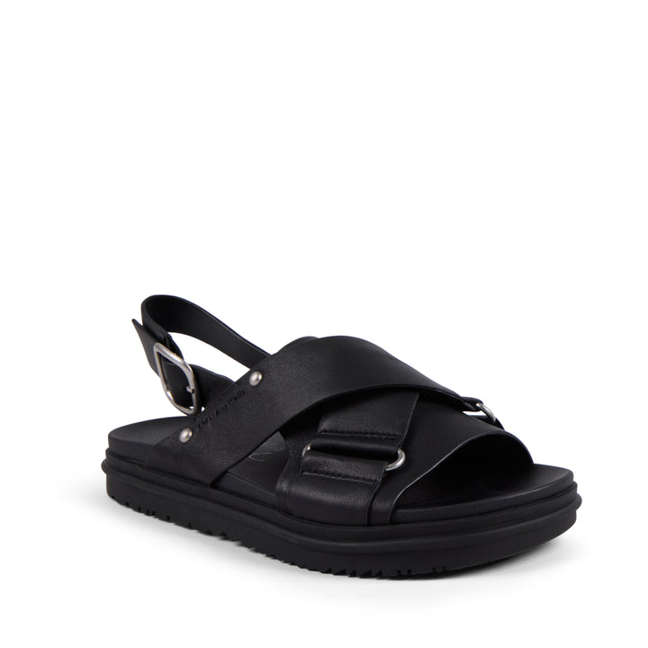 EMU Australia Faye Black leather crossover buckle sandal side view.