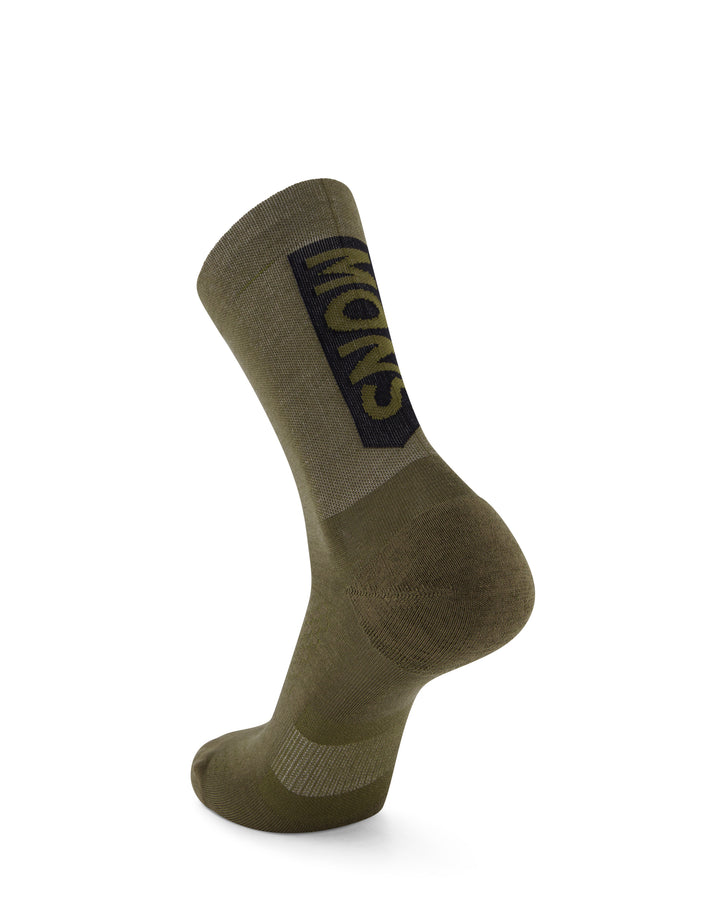 Unisex Atlas Merino Crew Sock in soft merino wool, featuring a comfortable crew-length design, breathable fabric, moisture-wicking performance, and all-day warmth for outdoor adventures and everyday wear.
