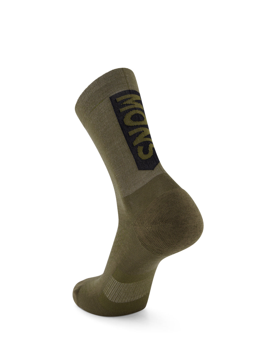 Unisex Atlas Merino Crew Sock in soft merino wool, featuring a comfortable crew-length design, breathable fabric, moisture-wicking performance, and all-day warmth for outdoor adventures and everyday wear.
